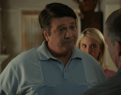 Man In Blue Shirt Saying Sure Why Not GIF