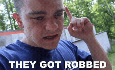 Man In Blue Shirt Saying They Got Robbed GIF