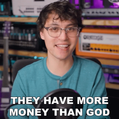 Man In Blue Shirt Saying They Have More Money Than God GIF