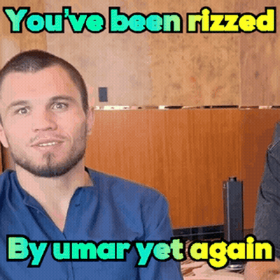 Man In Blue Shirt Saying You've Been Rizzed By Umar Yet Again GIF