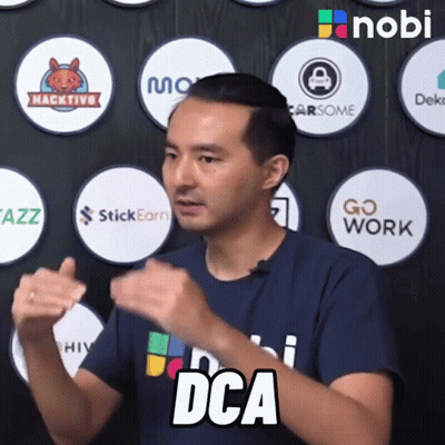 Man In Blue Shirt Says DCA In Front Of Logos GIF