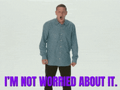 Man In Blue Shirt Says I'm Not Worried About It In Purple Letters GIF