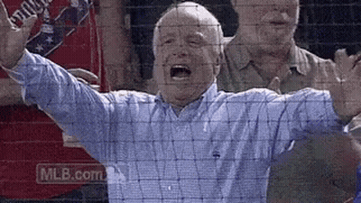 Man In Blue Shirt Screaming At Baseball Game GIF