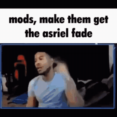 Man In Blue Shirt Sitting At Computer GIF