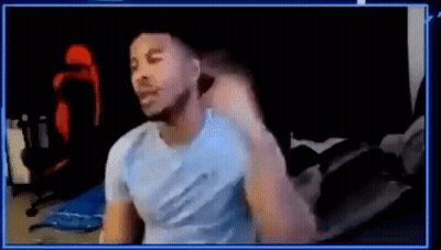 Man In Blue Shirt Sitting At Computer GIF