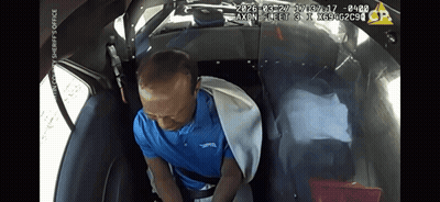 Man In Blue Shirt Sitting In Car GIF