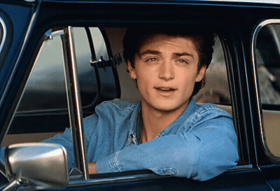 Man In Blue Shirt Sitting In Car GIF