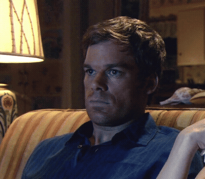 Man In Blue Shirt Sitting On Couch GIF