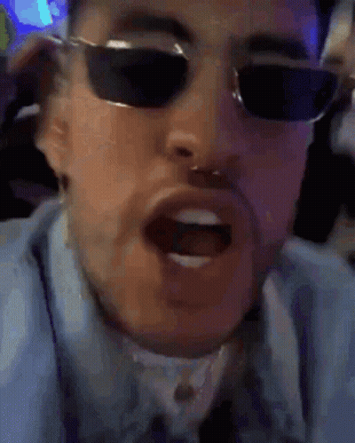 Man In Blue Shirt Smiling And Making Funny Face GIF