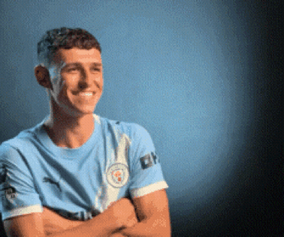 Man In Blue Shirt Smiling Arms Crossed GIF