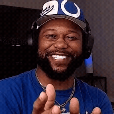 Man In Blue Shirt Smiling Peace Sign GIF