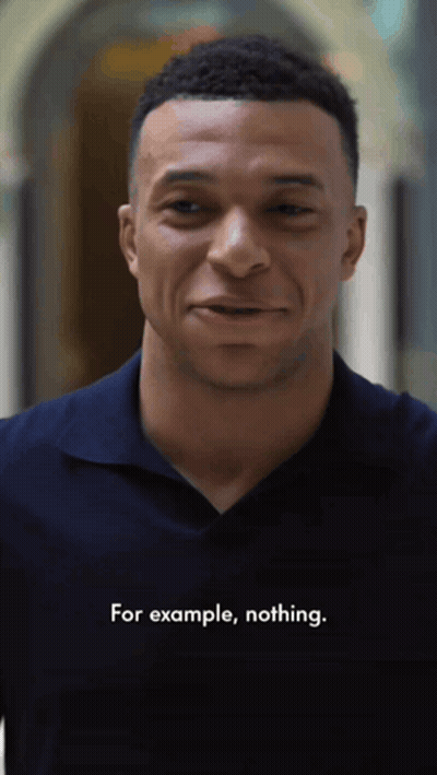 Man in Blue Shirt Smiling Saying For Example Nothing