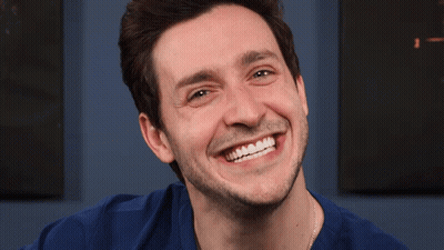 Man In Blue Shirt Smiling GIF