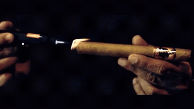 Man In Blue Shirt Smoking Cigar With Cigar Zeet GIF