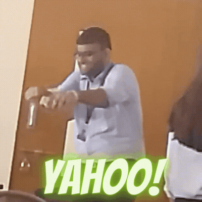 Man In Blue Shirt Standing In Front Of Yahoo Door GIF