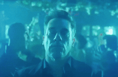 Man In Blue Shirt Standing GIF
