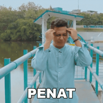 Man In Blue Shirt Standing On Bridge Saying Penat GIF
