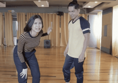 Man In Blue Shirt Swinging Tennis Racquet Steve Furgals Banner GIF