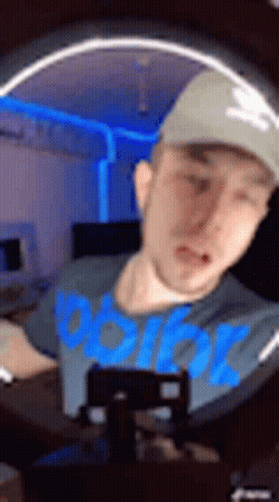 Man In Blue Shirt Taking Selfie GIF