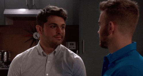 Man In Blue Shirt Talking GIF