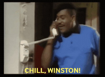 Man In Blue Shirt Talking On Phone Chill Winston GIF
