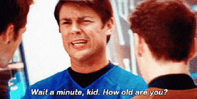 Man In Blue Shirt Talking To Another Man GIF