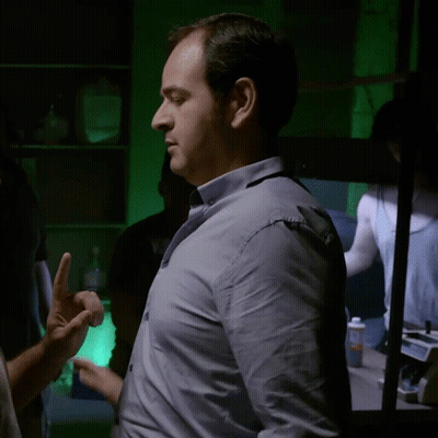 Man In Blue Shirt Talking To Another Man GIF