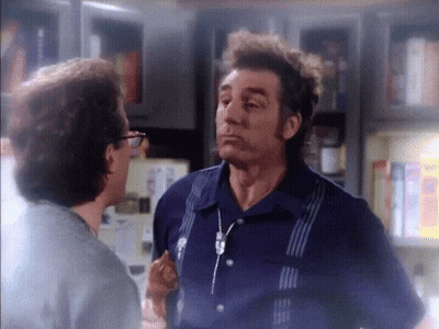 Man In Blue Shirt Talking To Another Man GIF