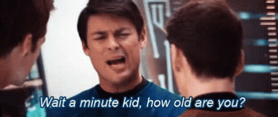 Man In Blue Shirt Talking To Another Man GIF