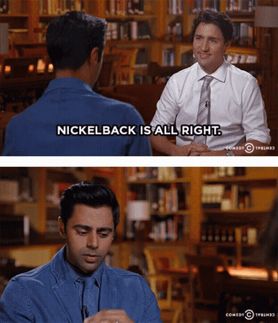 Man In Blue Shirt Talking To Man Saying Nickelback Is All Right GIF