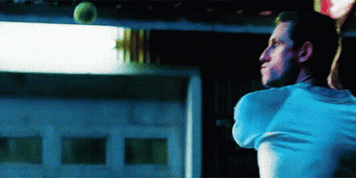 Man In Blue Shirt Throwing Ball GIF