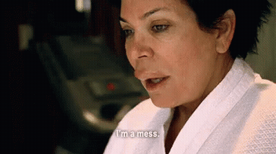 Man In Blue Shirt, Tie, And TMC Bricks GIF
