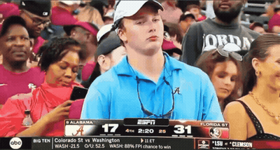 Man In Blue Shirt Watching Alabama Vs Washington GIF