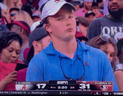 Man In Blue Shirt Watching Game On ESPN GIF