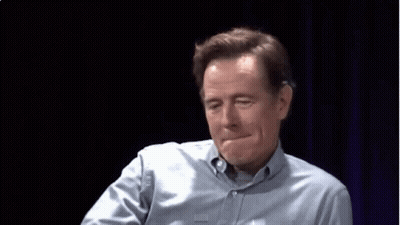 Man In Blue Shirt Waving In Dark GIF