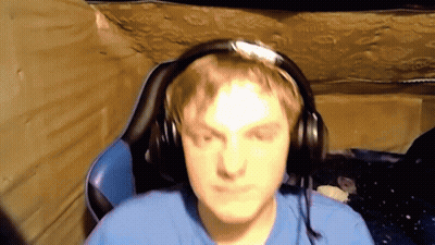 Man In Blue Shirt Wearing Headphones GIF
