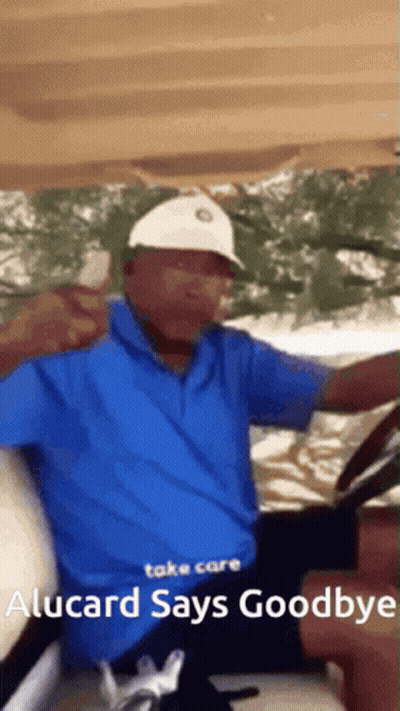 Man In Blue Shirt White Hat Driving Golf Cart Goodbye GIF
