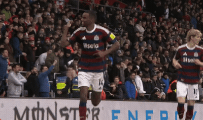 Man In Blue Shirt With Airways Standing On Soccer Field GIF