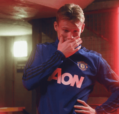 Man In Blue Shirt With Aon GIF
