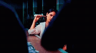 Man In Blue Shirt With Arms Crossed In Front Of Acer Monitor GIF