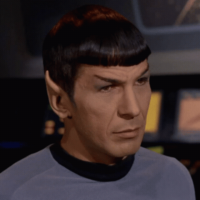 Hombre con camisa azul y cuello negro GIF