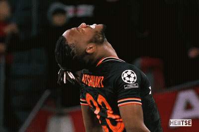Man In Blue Shirt With Bundesliga Logo GIF