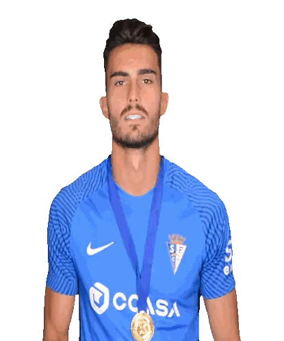 Man In Blue Shirt With Casa Medal Sticker