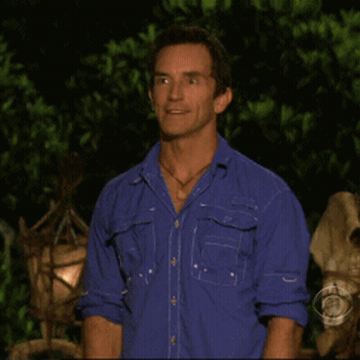 Man In Blue Shirt With CBS Logo GIF
