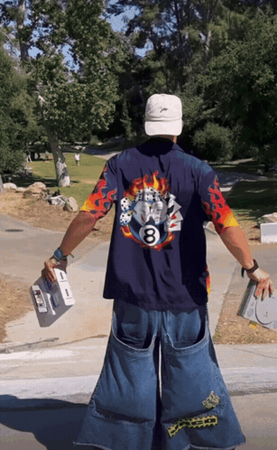 Man In Blue Shirt With Flames And Number 8 GIF