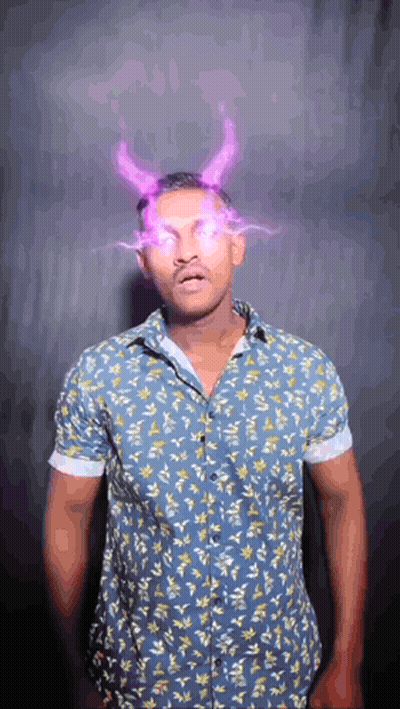 Man In Blue Shirt With Horns GIF