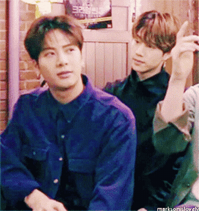 Man In Blue Shirt With I Love You Wrist Tattoo GIF