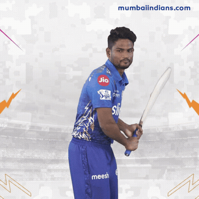 Man In Blue Shirt With Jio Holding Bat GIF