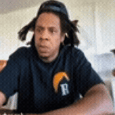 Man In Blue Shirt With Letter R GIF