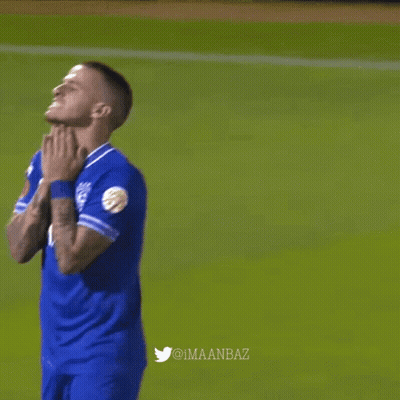 Man In Blue Shirt With Letter V GIF